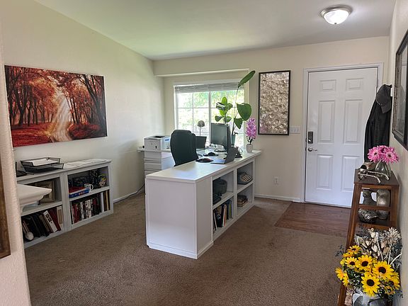 The front entrance room is currently an office. This space can be used in various ways.