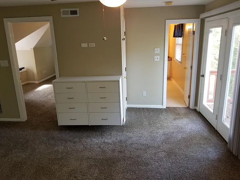 Master suite looking into office and bath