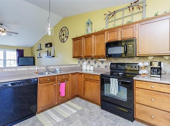 Kitchen with Maple Cabinets and Crown Molding