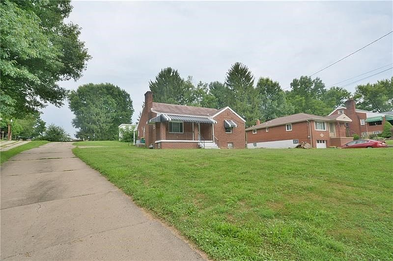 This 3-4 bedroom family home is larger that is looks with over a half acre for the kids to play in too!