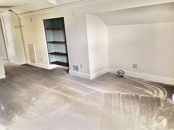 Living room with built in book shelves