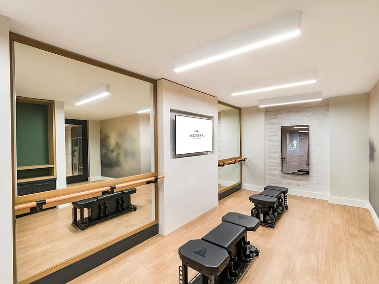 Stay active in the dedicated fitness studio featuring barre, on-demand classes, or versatile strength training space.
