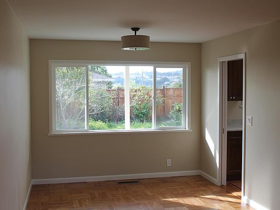 Formal dining area adjacent to living room