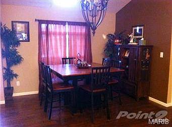 Open Dining Area with Hardwood Floors