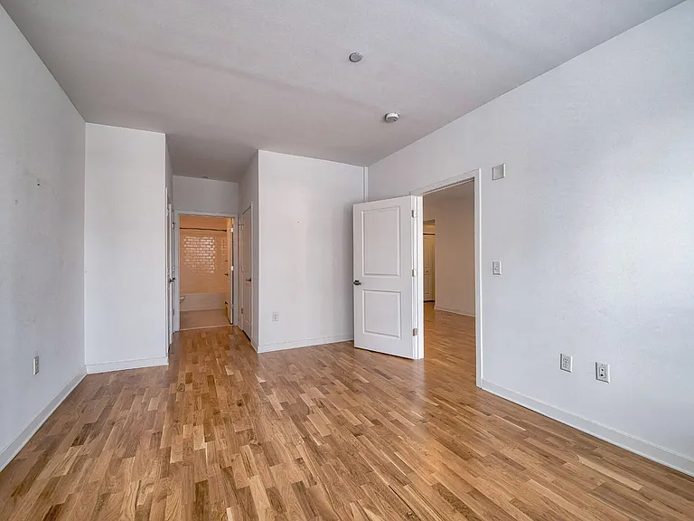 Hardwood flooring is throughout in every home