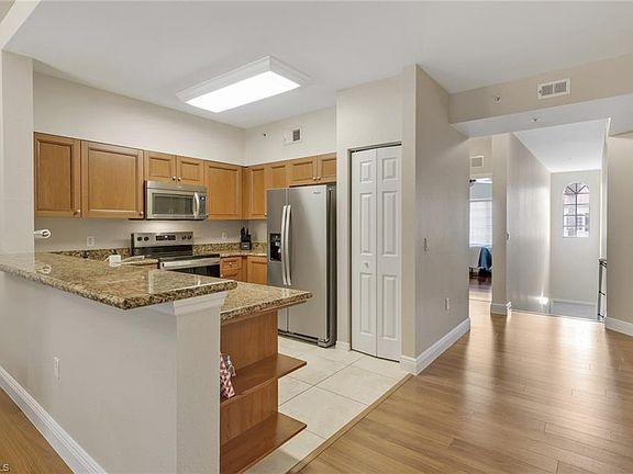 2nd image of 10100 Villagio Palms WAY #203