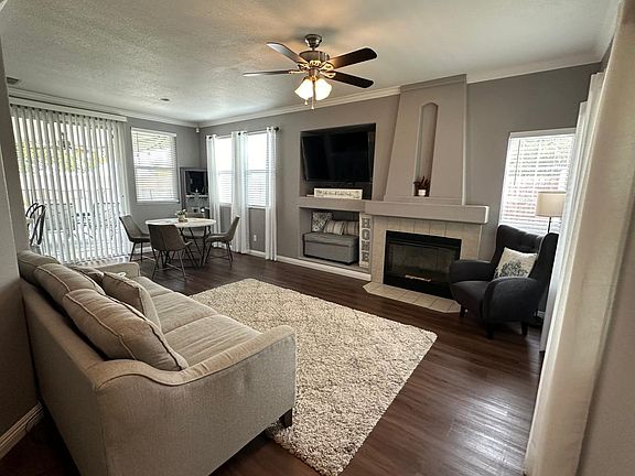 Sit and relax on the comfy sofa and watch a movie on the 55" HD Smart TV