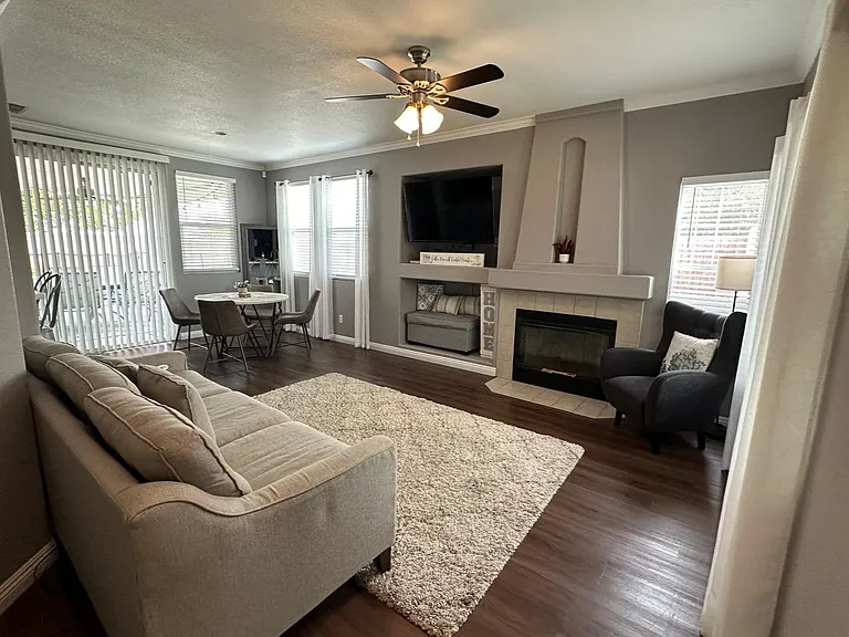 Sit and relax on the comfy sofa and watch a movie on the 55" HD Smart TV