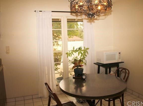 Cheerful Breakfast Room Adjacent to Kitchen