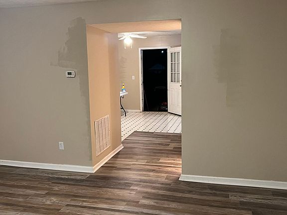 Large living room with new vinyl luxury flooring.