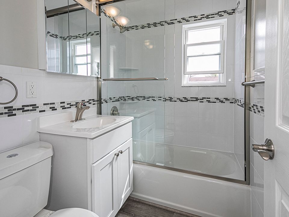Renovated bathrooms with glass shower doors