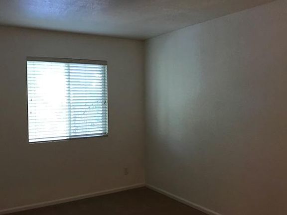 Master bedroom with plenty of room for a queen bed, side table