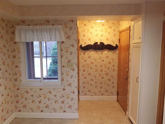 Kitchen with Side and Basement Entrance