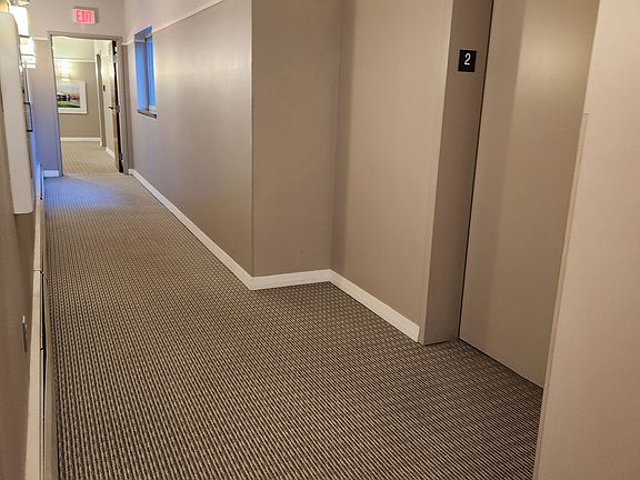 Clean quiet hall with elevator right across the hall. Parking stall in front of the garage elevator.Couldnt be any closer.