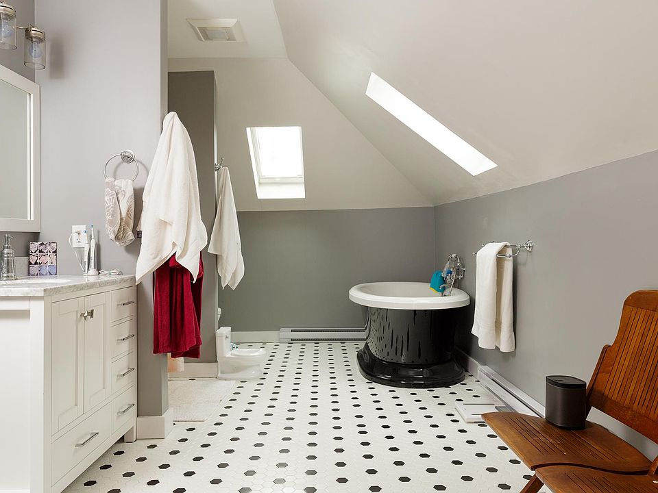 soaking tub right, shower & toilet left