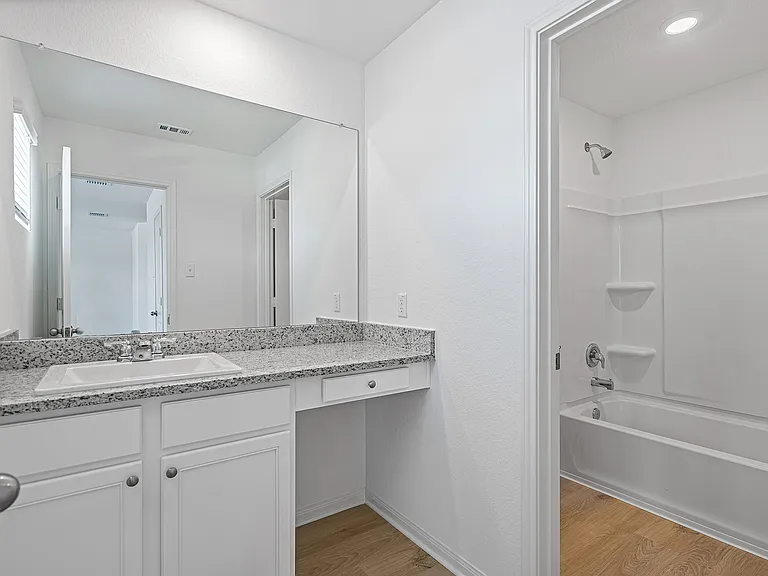 The vanity in the master bathroom is perfect for getting ready each day.