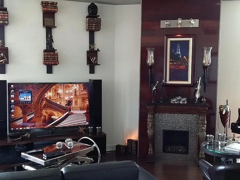 Living room with ornamental fireplace