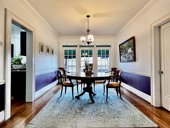French doors open to large patio overlooking the condo's pocket park