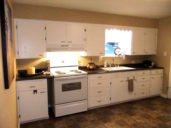 Spacious Open Kitchen, New Counter Tops, Flooring, Lighting, Paint etc etc. Refrigerator can go on t