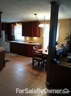 Kitchen
						:
						Newly remodeled. Cherry wood cabinets.