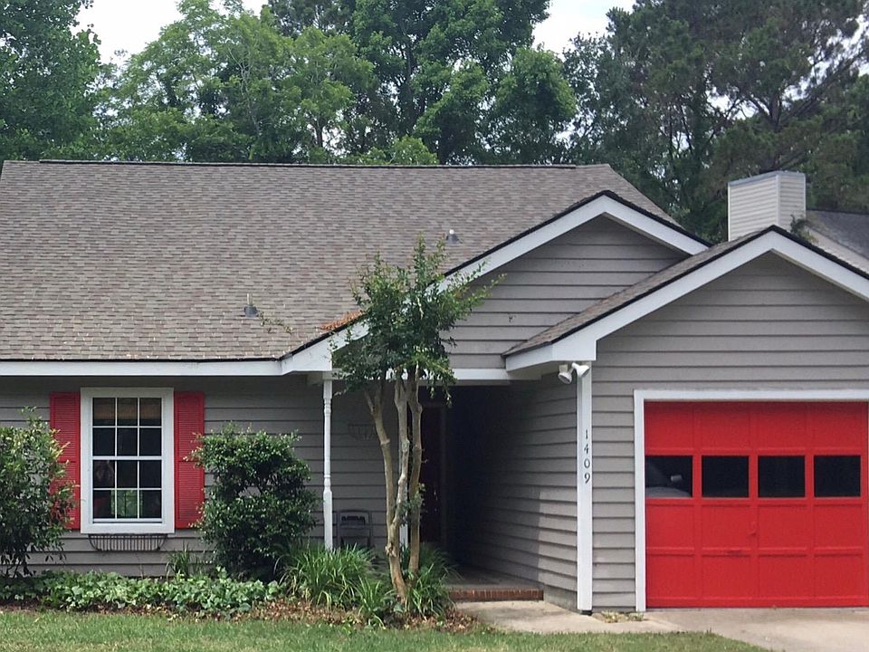 Very private house that is much larger than looks. Cathedral ceilings and bonus upstairs office room with built in desk and shelves