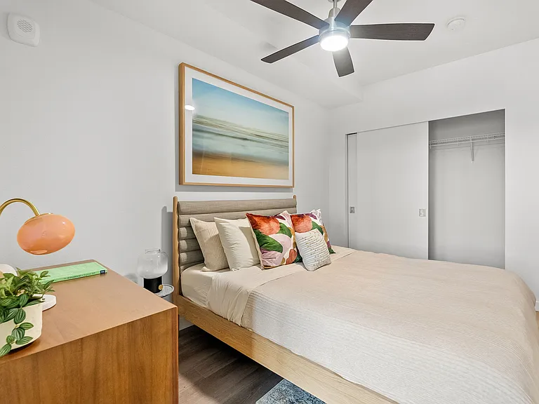 Modern comfort awaits: Bedrooms feature vinyl flooring and ceiling fans, combining style with practicality for a serene and comfortable retreat. ____