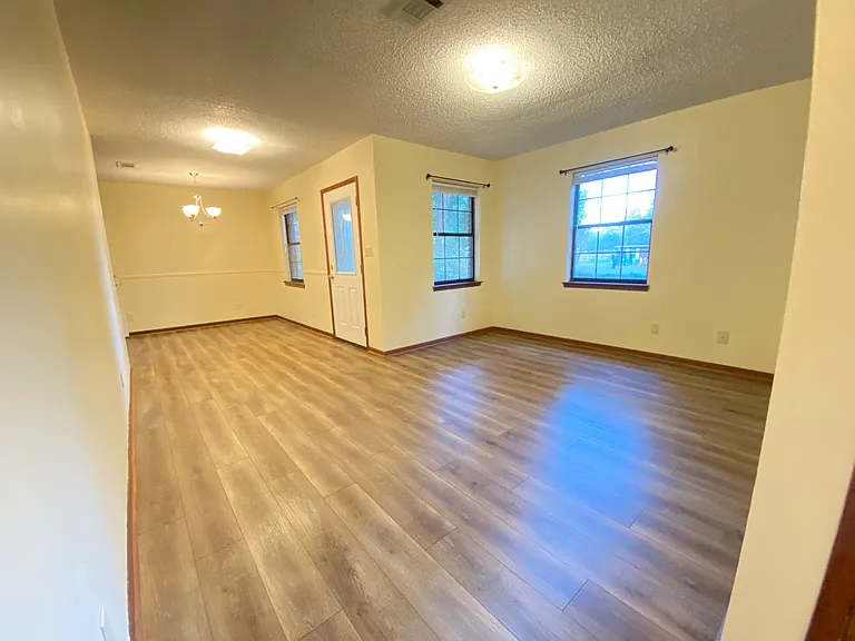 front door, left dining room, right living room