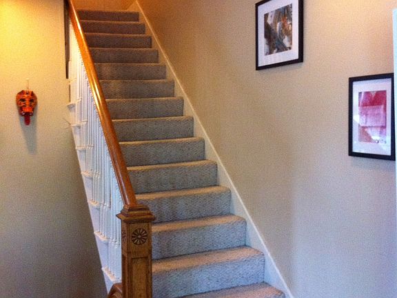 Stairs lead to third floor bedrooms