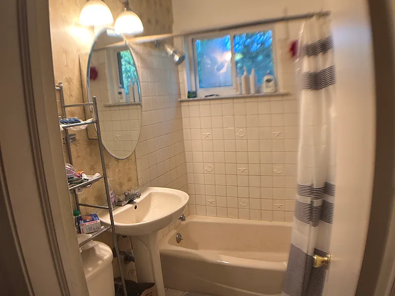 Upstairs full bath with tub.