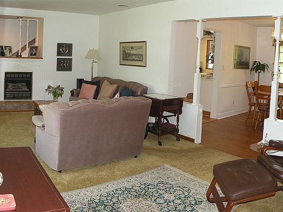 Living Room w/Hardwood under w/w Carpeting