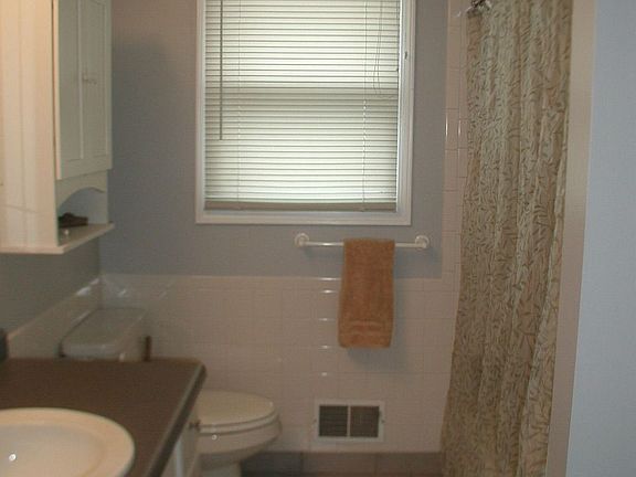great bathroom with large linen closet