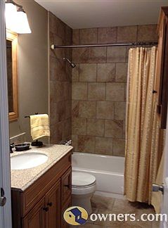 New fixtures, ceramic tile, new vanity, linen closet