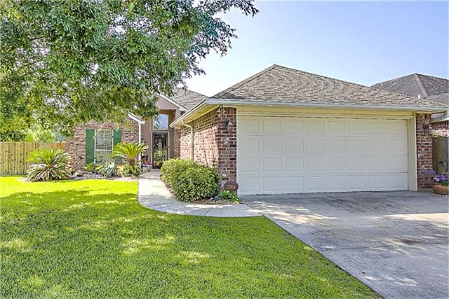 Welcome Home! Corner lot perfectly landscaped! There's also an extra storage room in the garage!