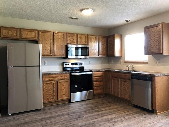 Stainless steel range, dishwasher and refrigerator with ice maker