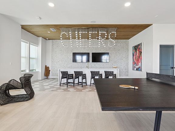 Social Lounge with TVs, Games, and Relaxing Spaces
