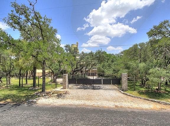Private gated entrance (street view)
also features a 2nd gated service entrance