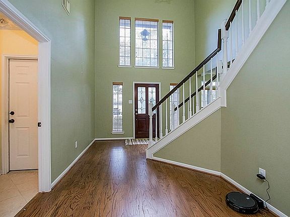 Entry With Lead Glass Front Door With 2 Story Entry.