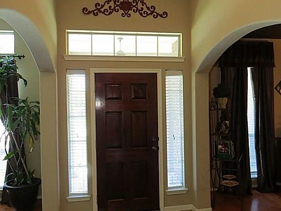 Elegant Entry with High Ceiling, Updated Tile Flooring