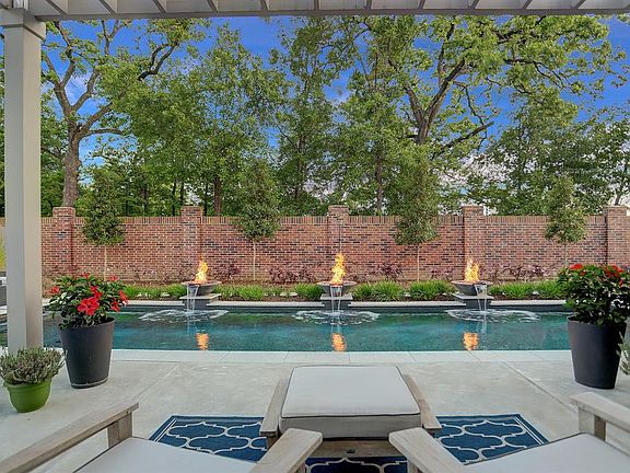 Welcome to your new back yard! Imagine relaxing on your patio while gazing at the fire bowls and listening to the soothing sounds of your water fountains.