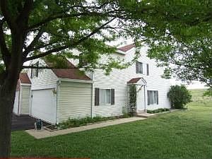 Backs to forest preserve