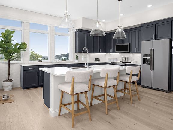 Kitchen with large windows and natural sunlight