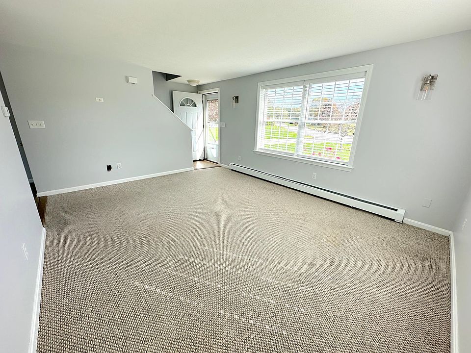 Front door from spacious, bright living room.