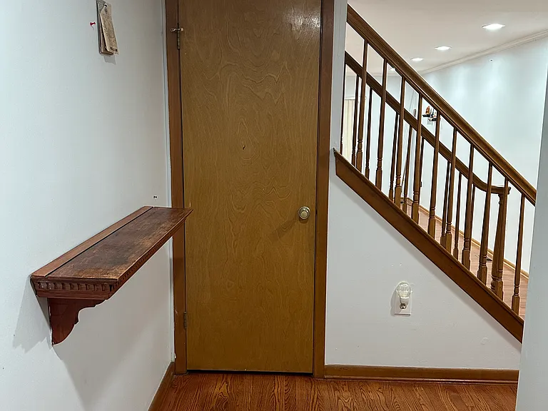 entrance, kitchen immediately to the left