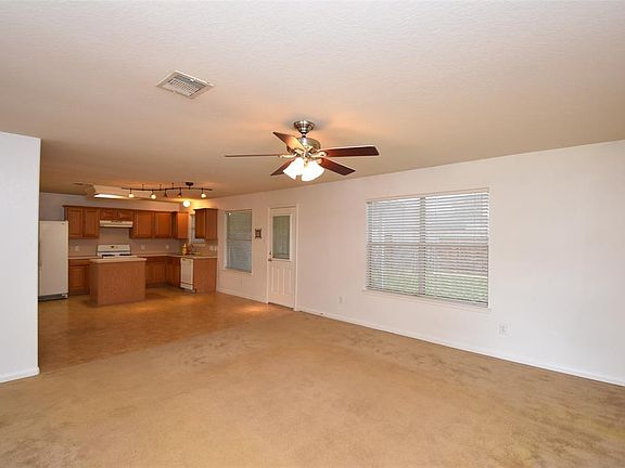 Large family room, that leads into the open kitchen.