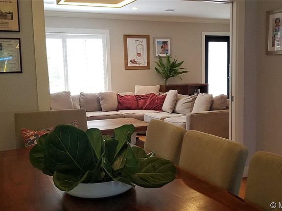 Dinning Area With Living Area in background