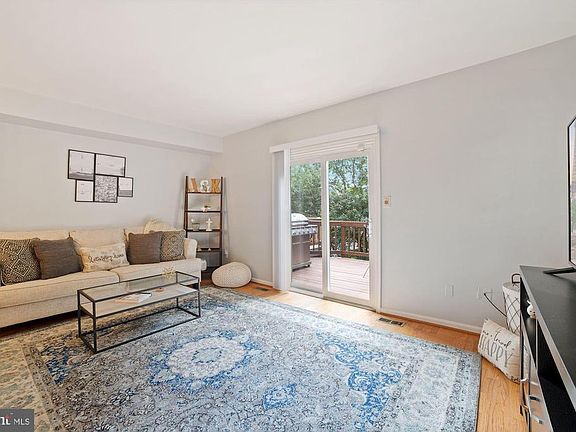 Living Room Opens to Spacious Deck