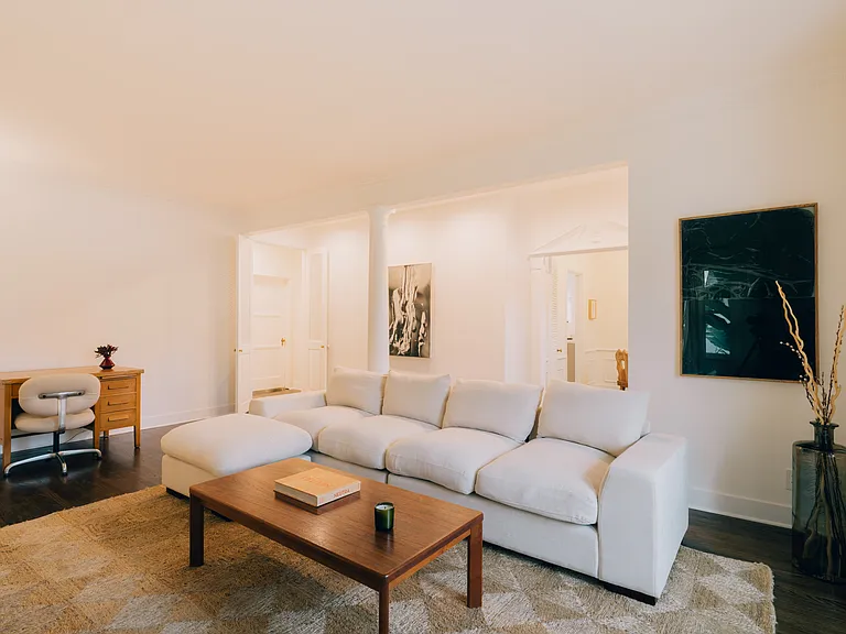 Living room facing dining room and bedroom