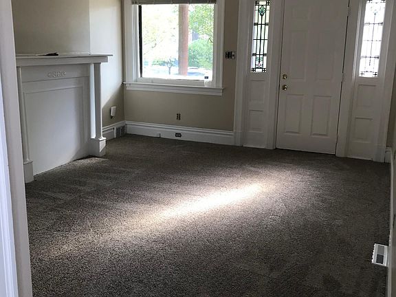 living room with stained glass windows