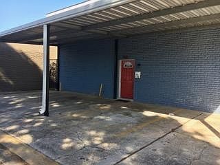 Front Entrance and Covered Parking