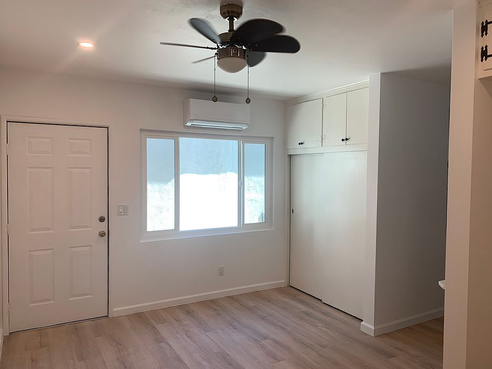 Studio looking to AC, new window and front door